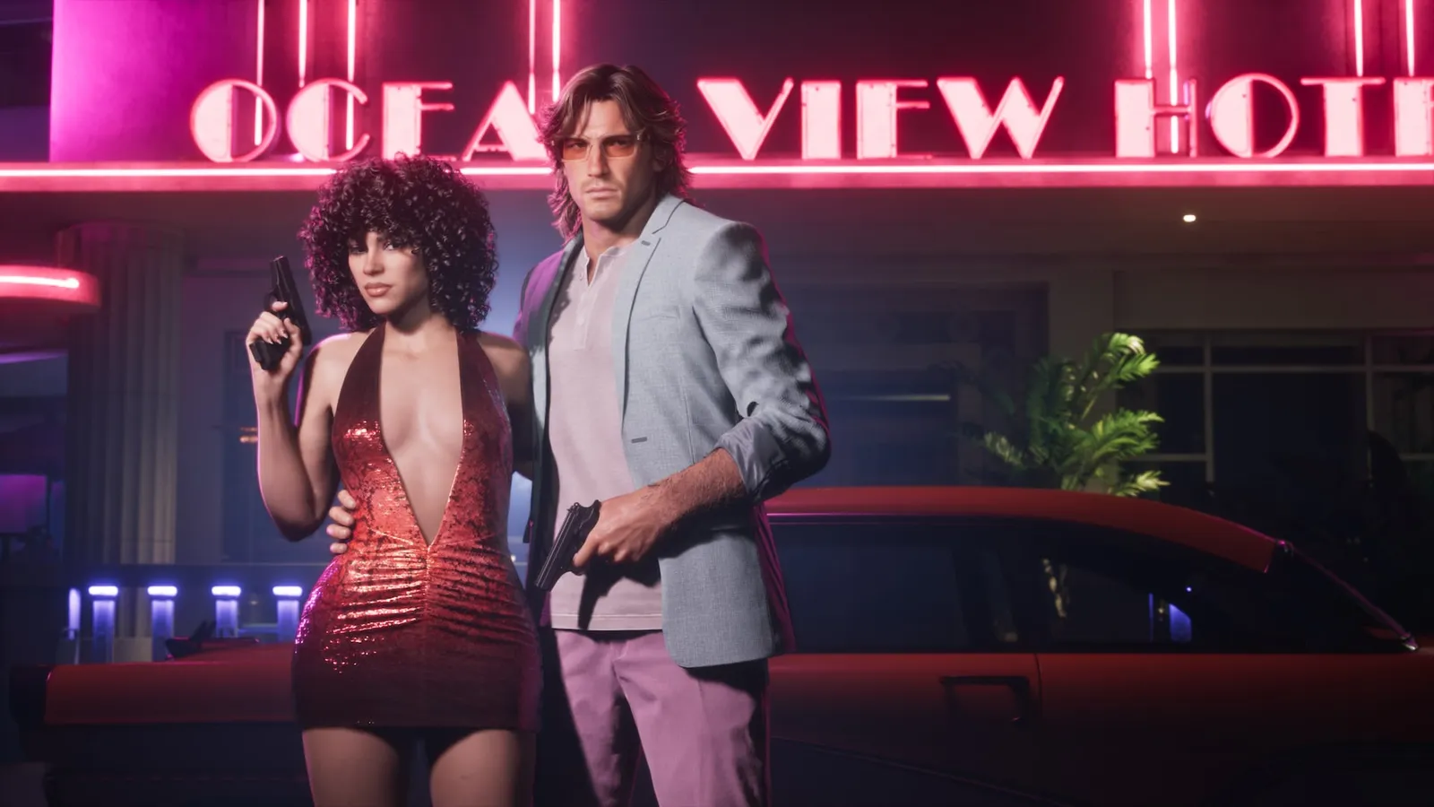 Lucia y Jason frente a un motel con luces de neón en Vice City, GTA 6